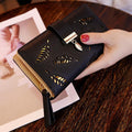 Portefeuille en cuir à feuilles dorées